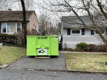 A 15 yard roll-off dumpster